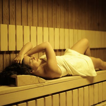 a woman in a sauna
