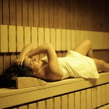 a woman in a sauna.