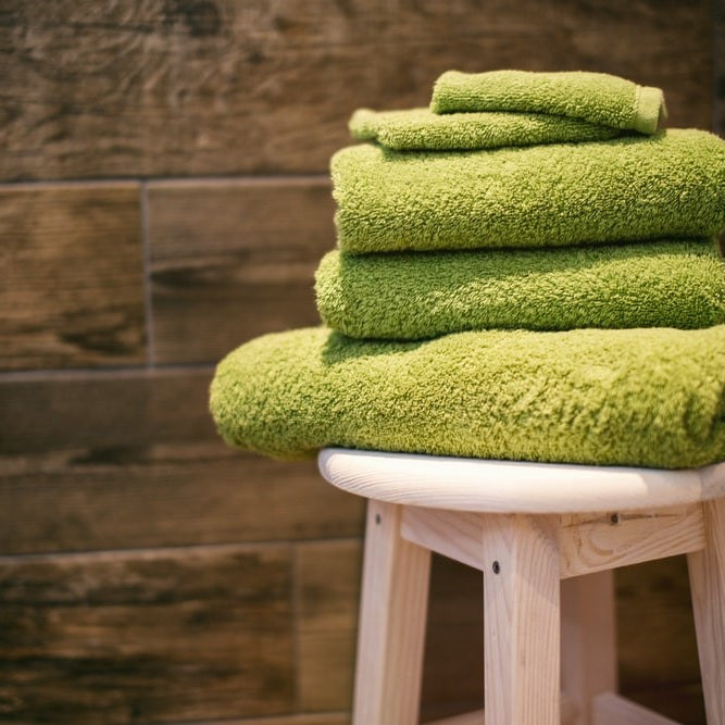 Green towels for sauna session