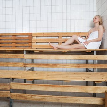 a woman inside a sauna