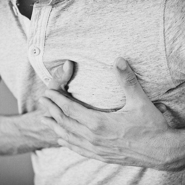  a man having chest pains and at risk for a heart attack